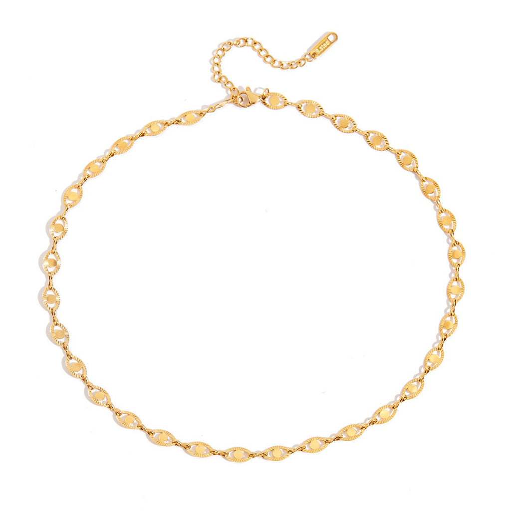 Gold chain bracelet on a white background
