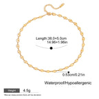 Gold necklace with measurement details on a white background