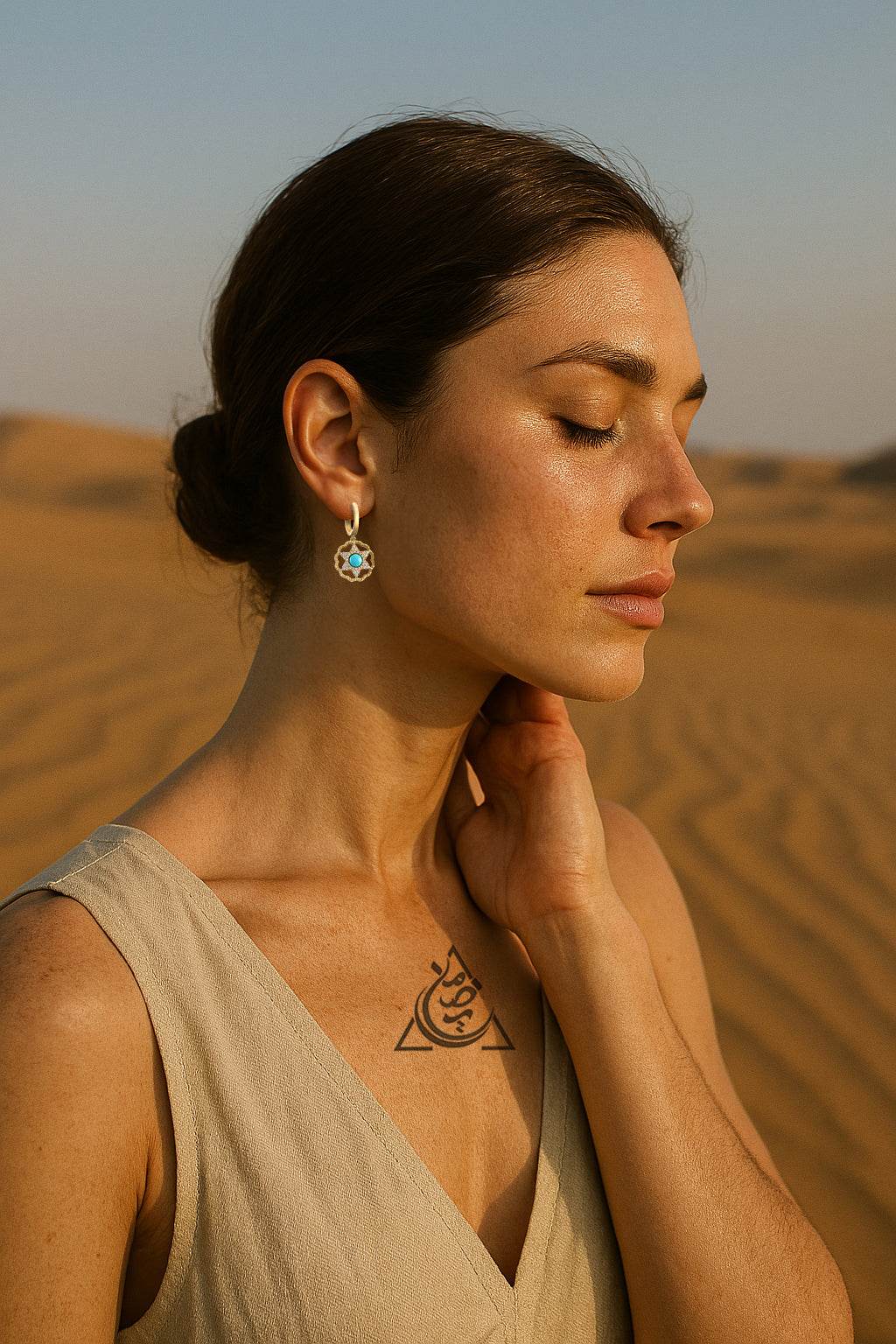 Luxury turquoise earrings with star-shaped design and gold detailing