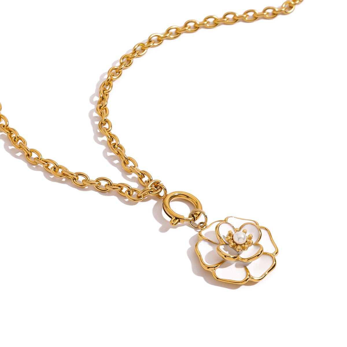 Gold chain necklace with a floral pendant on a white background