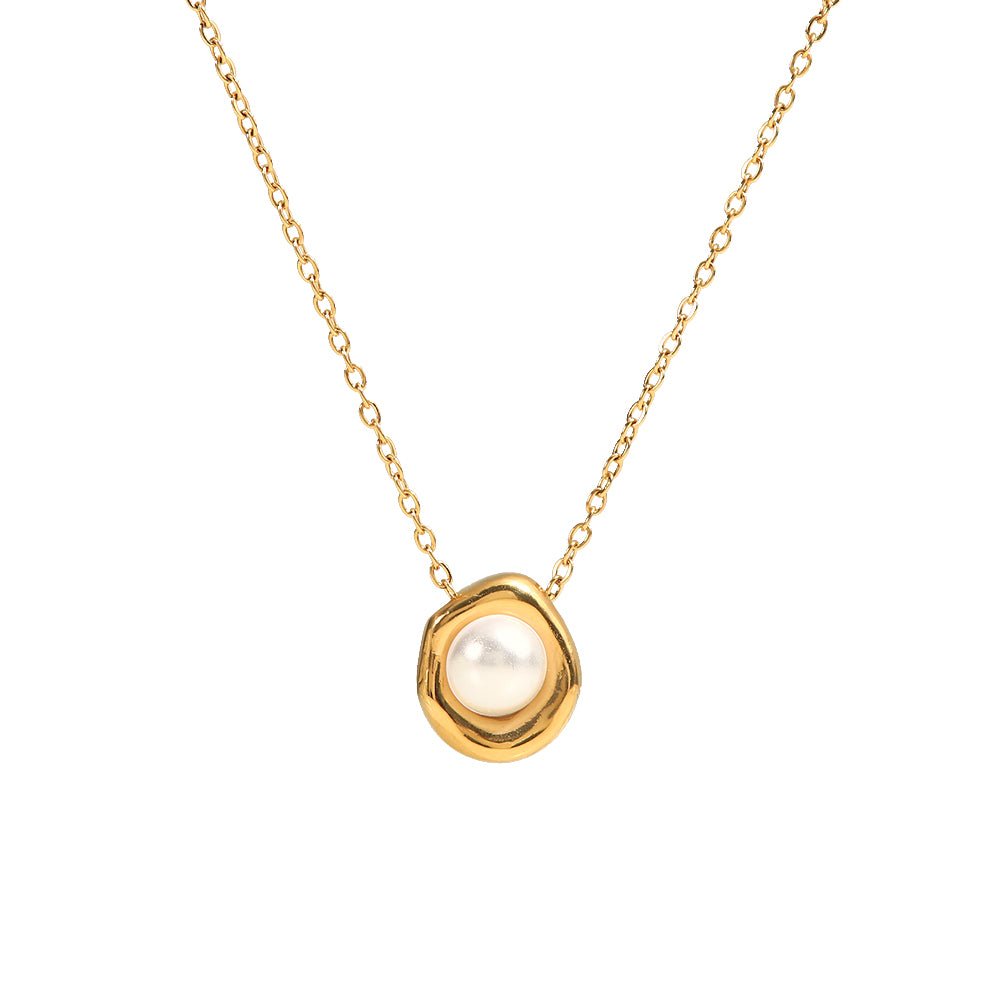 Gold necklace with a pearl pendant on a white background
