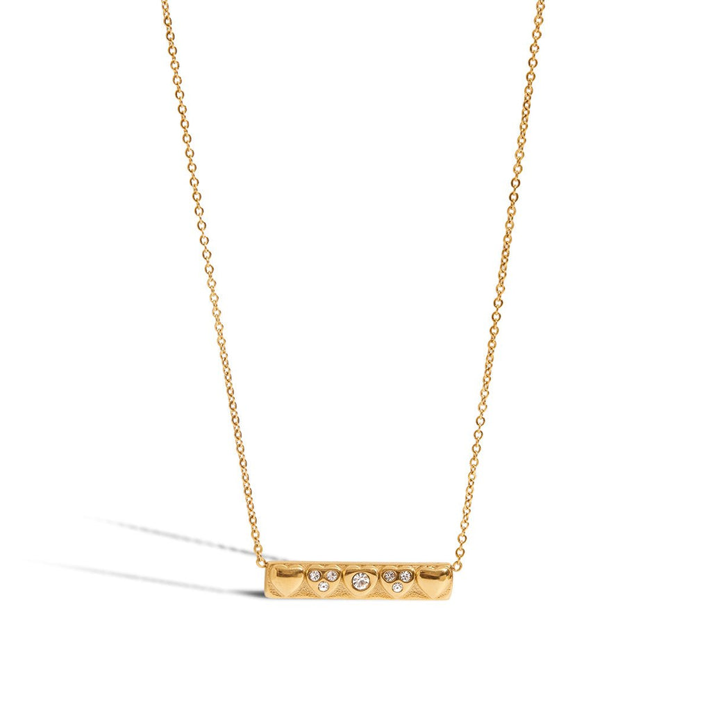 Gold necklace with a bar pendant on a white background