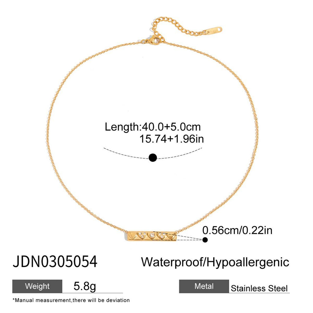 Gold necklace with measurement details on a white background