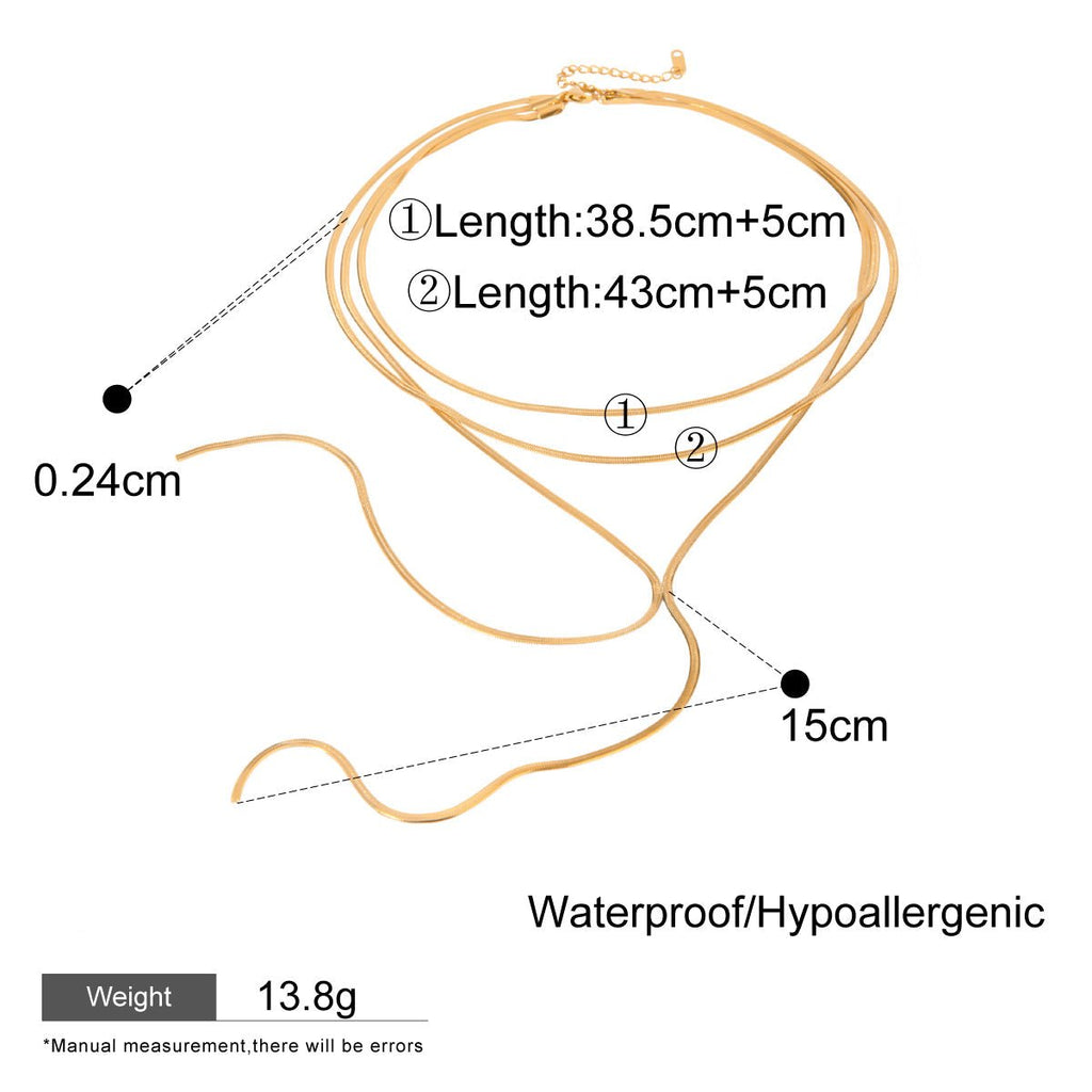 Gold necklace with measurements on a white background