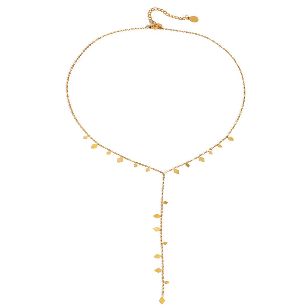 Gold necklace with small droplet pendants on a white background