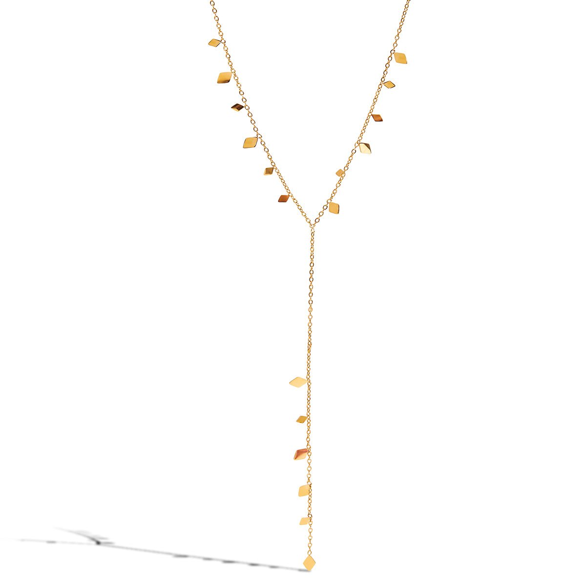 Gold necklace with leaf-like pendants on a white background