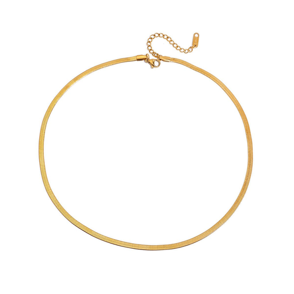 Gold necklace on a white background