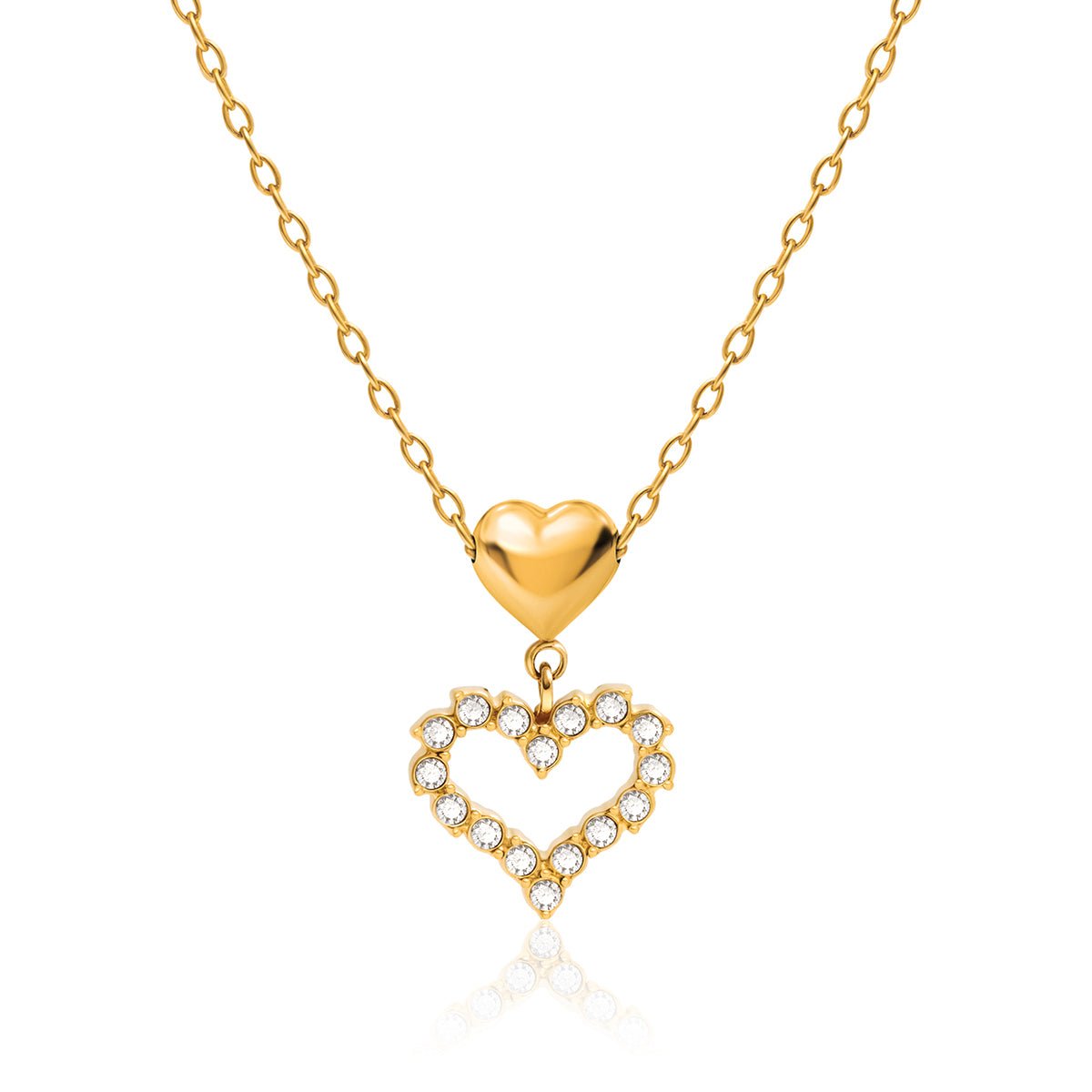 Gold heart-shaped necklace with a smaller heart pendant on a white background