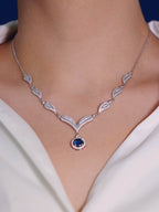 Close-up of Nyxsara Collection necklace with sapphire-like zirconia in polished silver