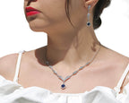 Luxury silver necklace with brilliant blue gemstone for formal occasions