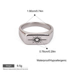 Silver ring with sun design and measurement details on a white background