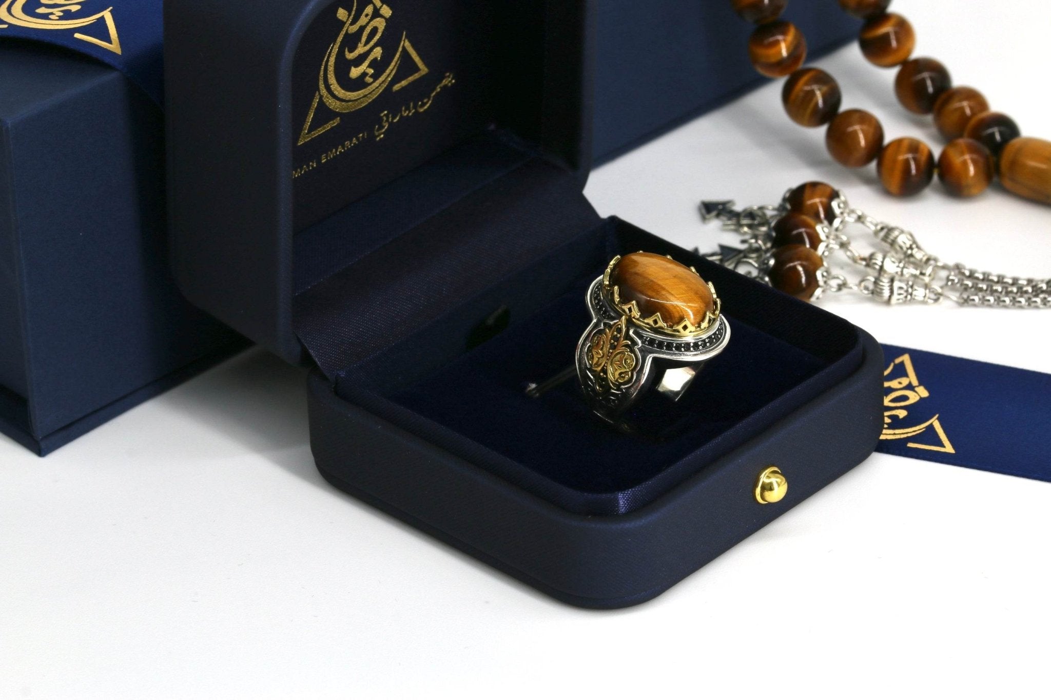 Side view of tiger eye ring with masculine silver design handcrafted in the UAE