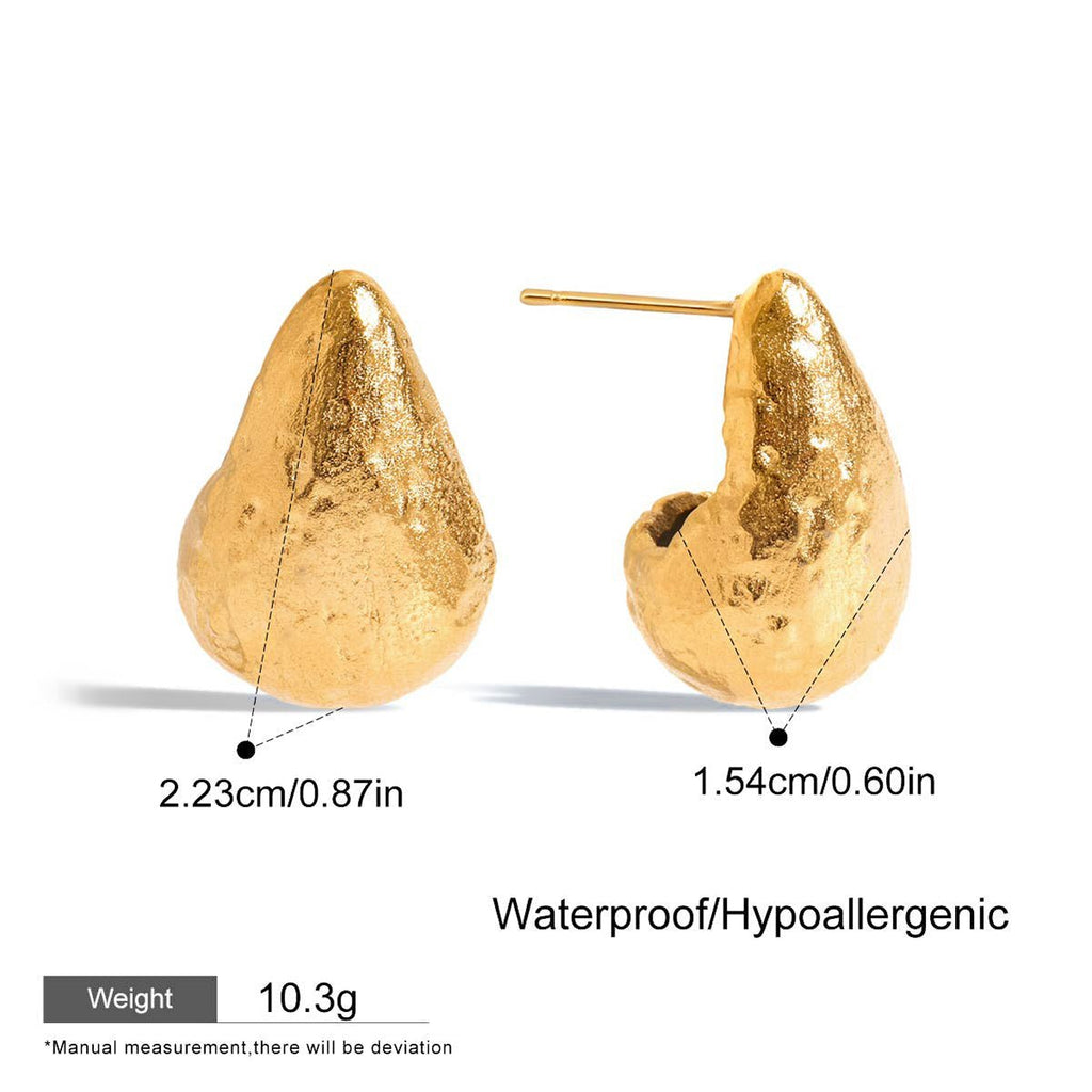 Gold teardrop-shaped earrings with measurements and material details on a white background