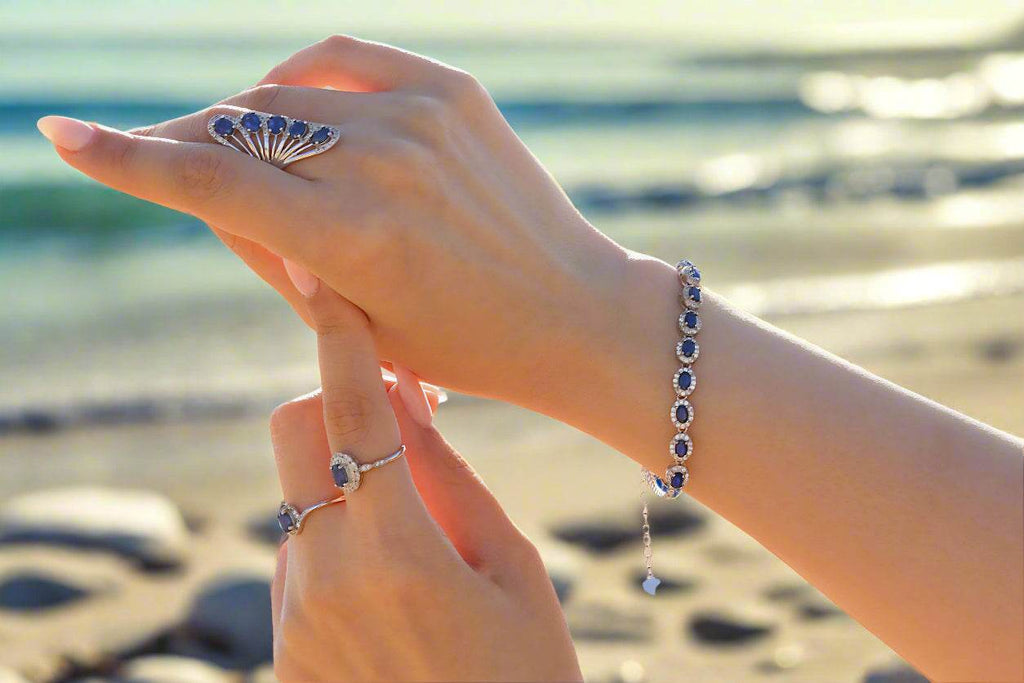  Nyxsara Collection ring showcasing a deep blue sapphire in sterling silver