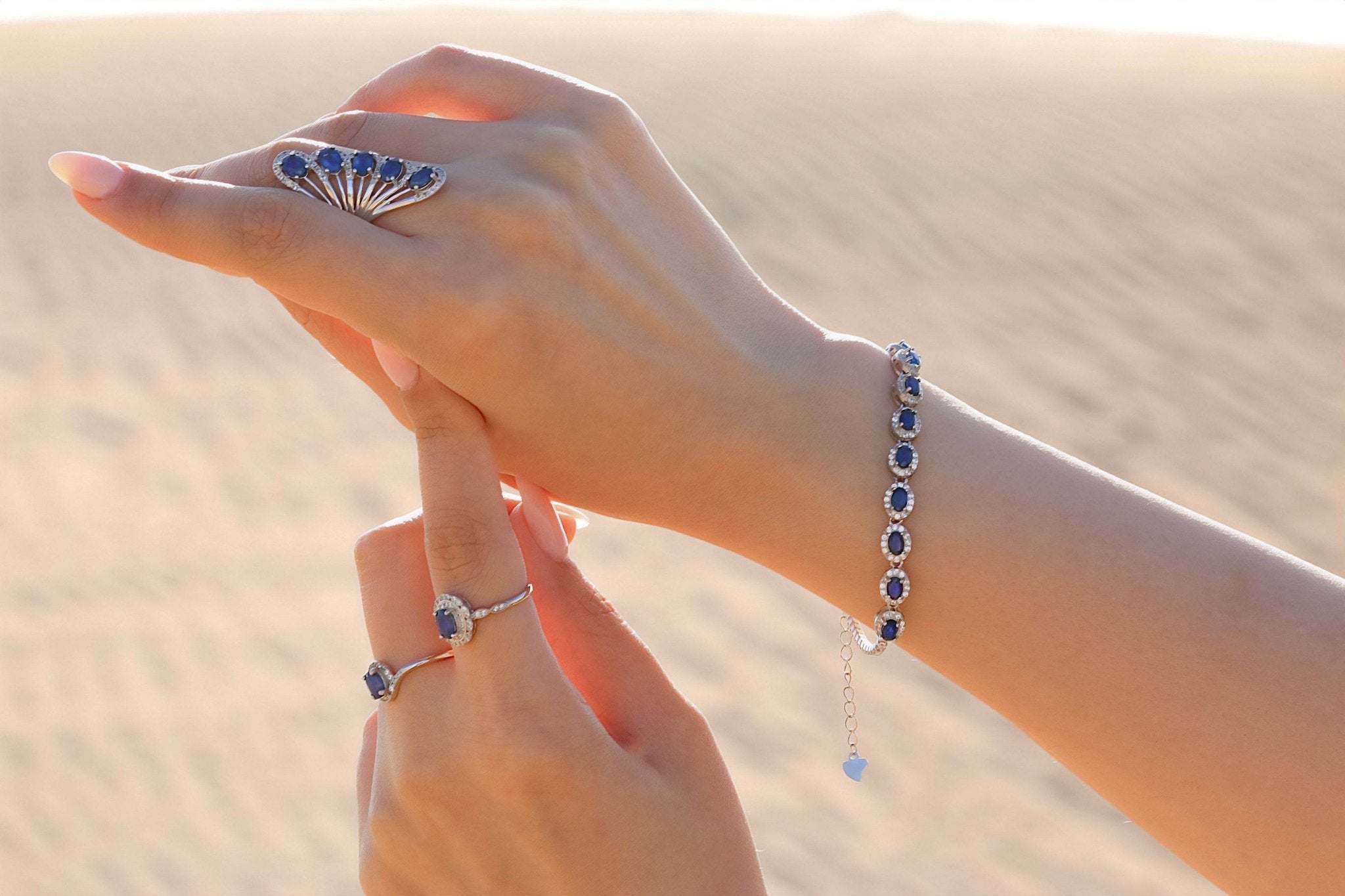 Elegant platinum silver bracelet with natural blue sapphires