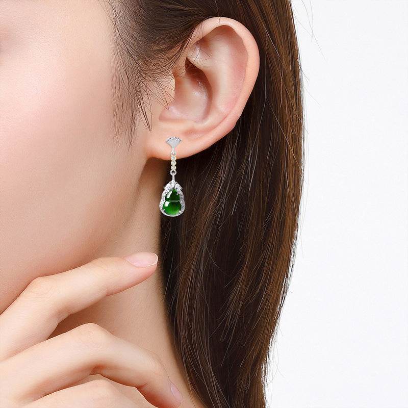 Luxury jade earrings in platinum silver with symbolic gourd shape
