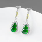 Platinum-plated silver drop earrings with jade and Eastern symbolism