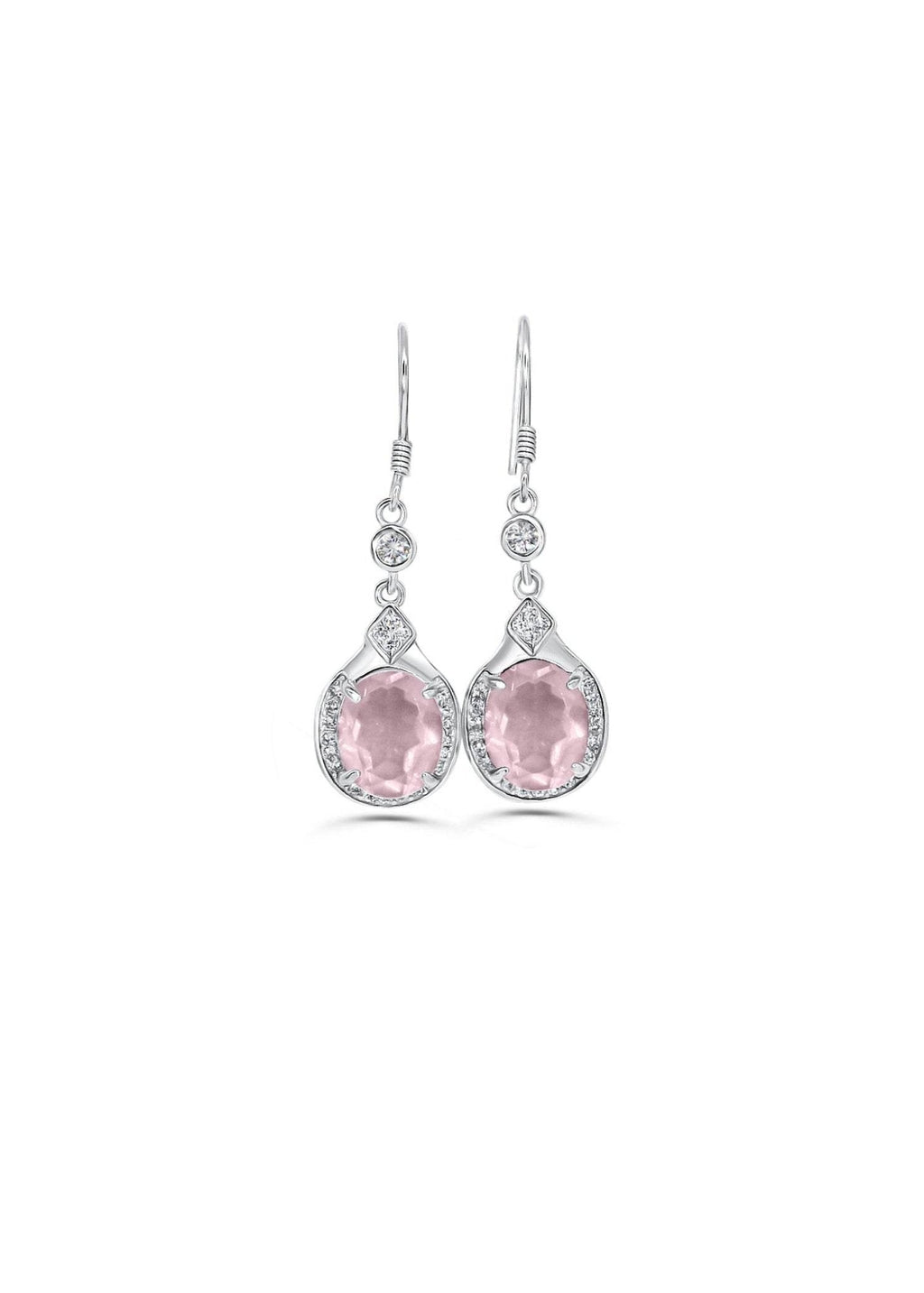 Close-up of soft pink crystal earrings in silver setting