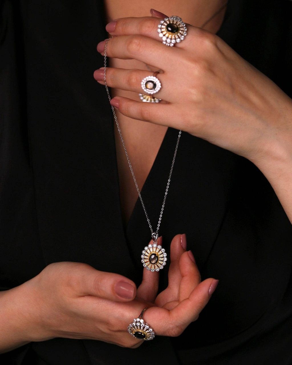 Statement celestial necklace featuring natural brown star sapphire and gold finish