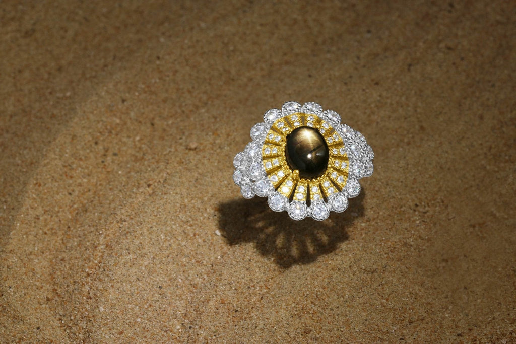 Elegant star sapphire ring with gold and zirconia accents