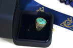 Statement men's ring with natural turquoise and gold-tone details