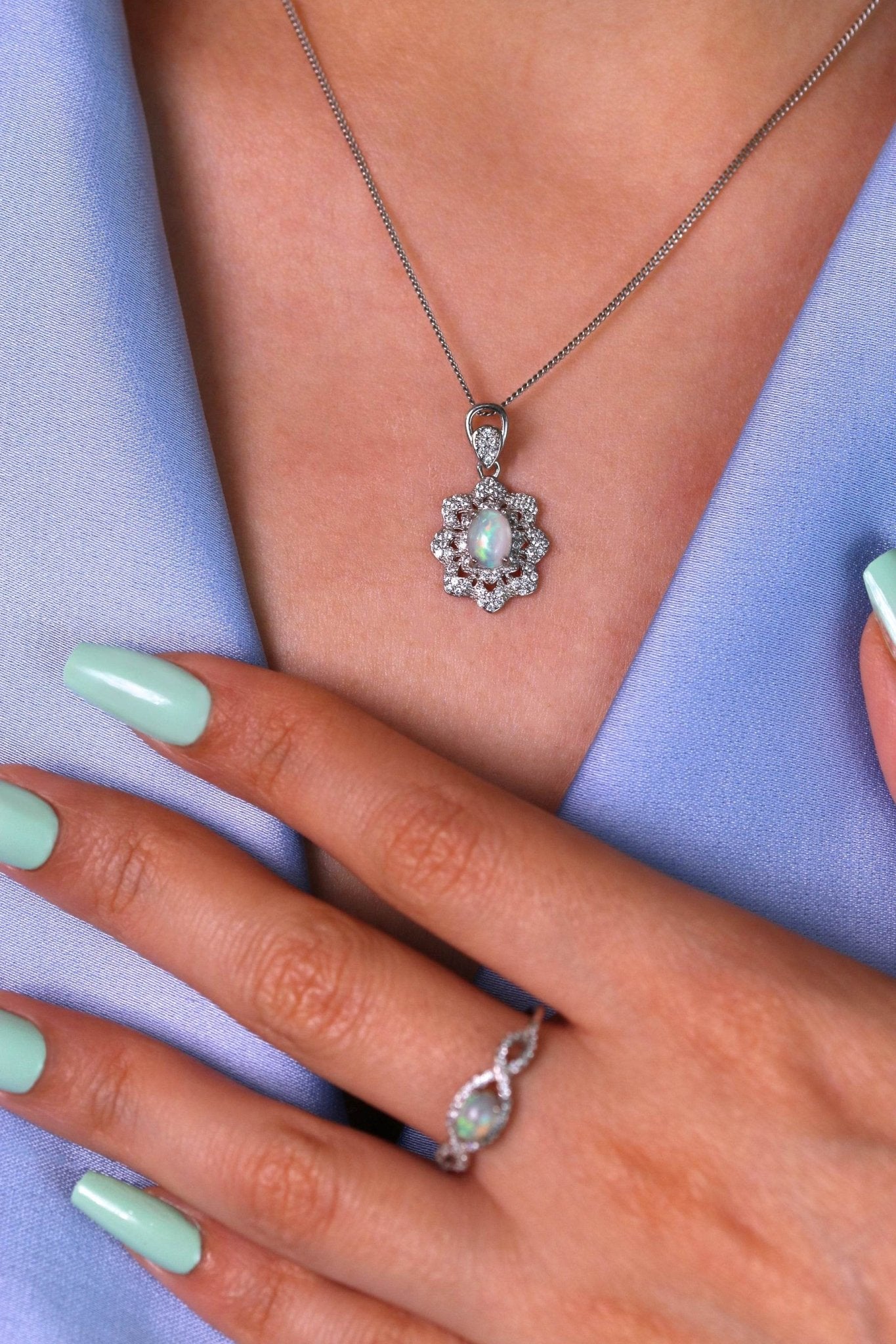 Elegant women’s necklace with shimmering white opal