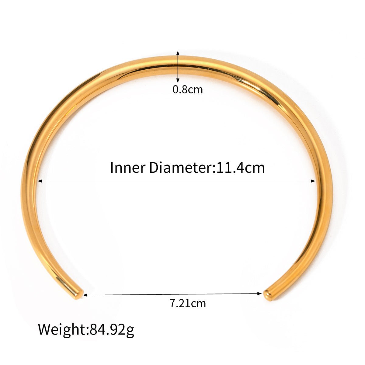 Gold bracelet with measurements on a white background
