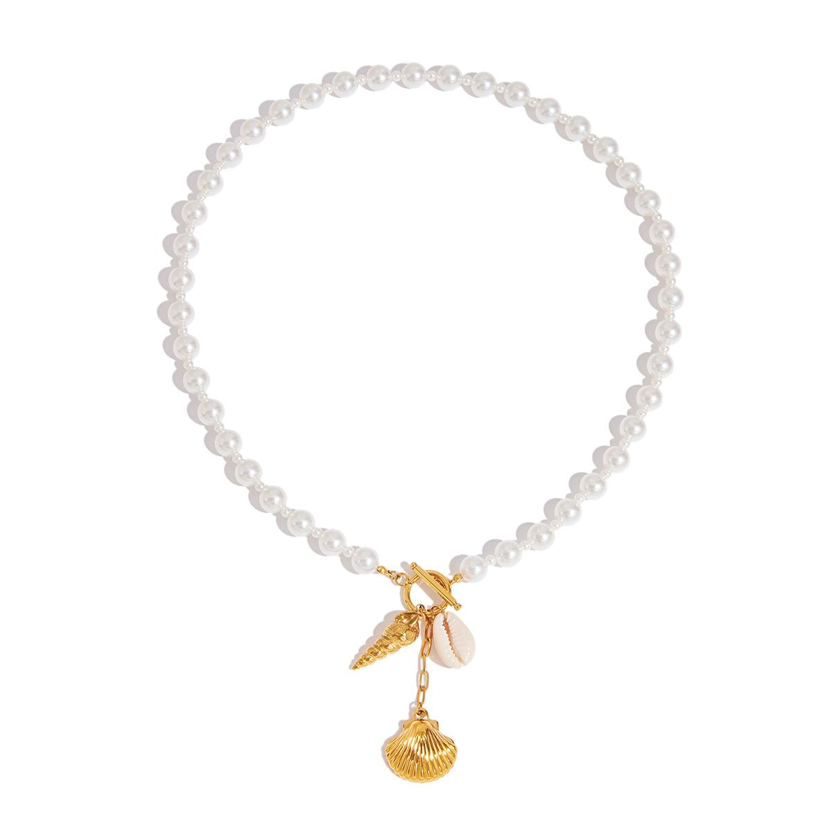 Pearl bracelet with gold charm featuring a leaf and shell on a white background