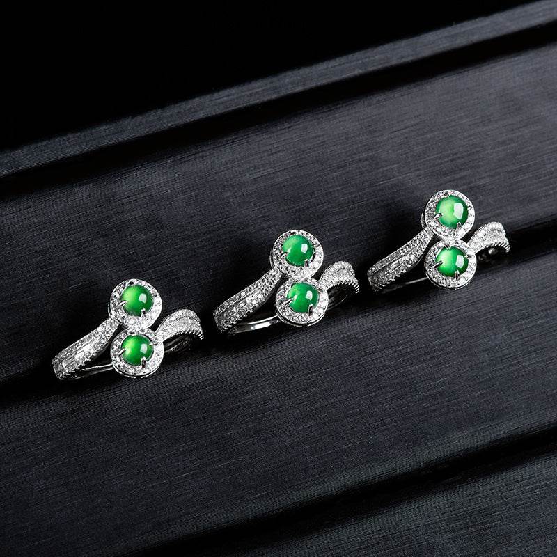 Feminine ring with green jade center and zirconia accents