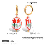 Floral earrings with gold hooks and measurements on a white background