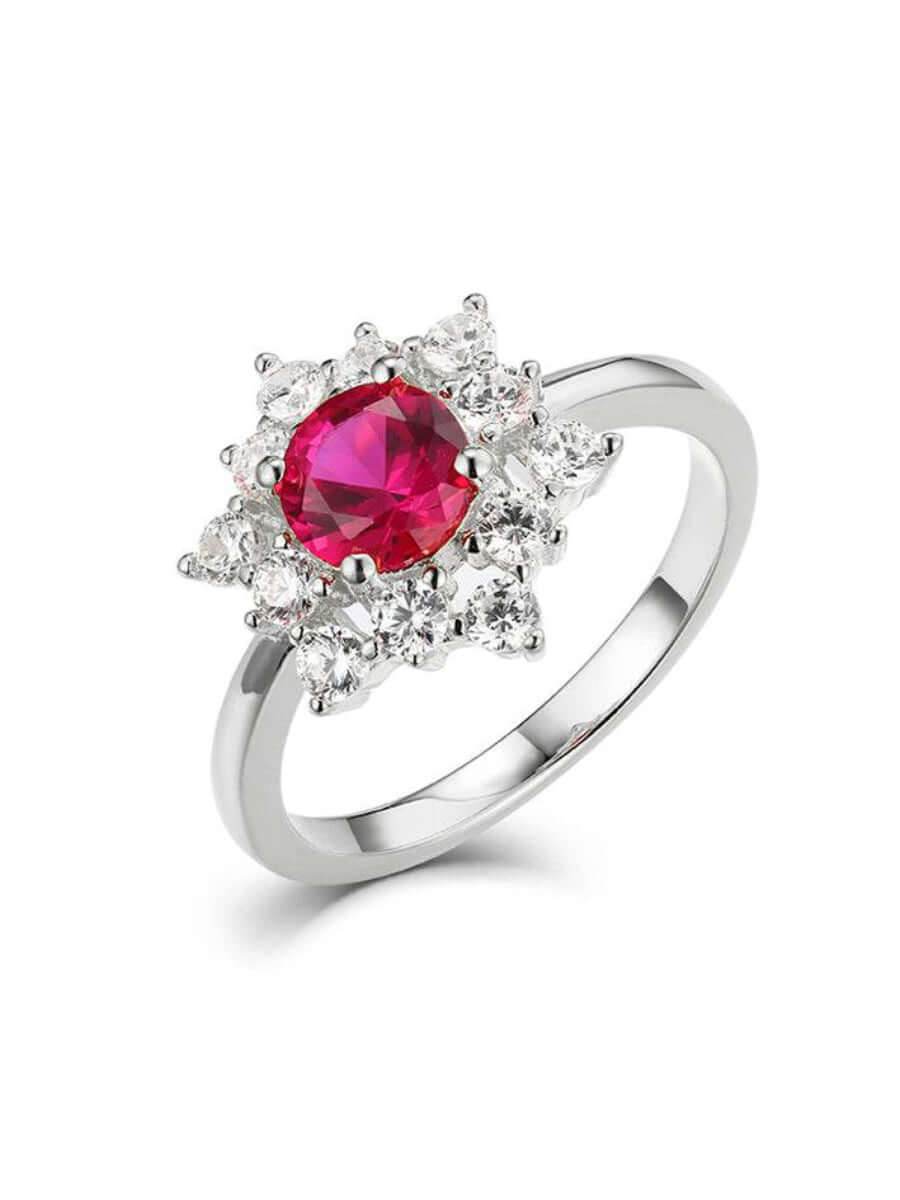 Ruby-cut red zirconia ring with white stone halo in silver