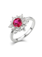 Ruby-cut red zirconia ring with white stone halo in silver