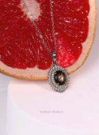 Star sapphire pendant necklace in white gold plated silver