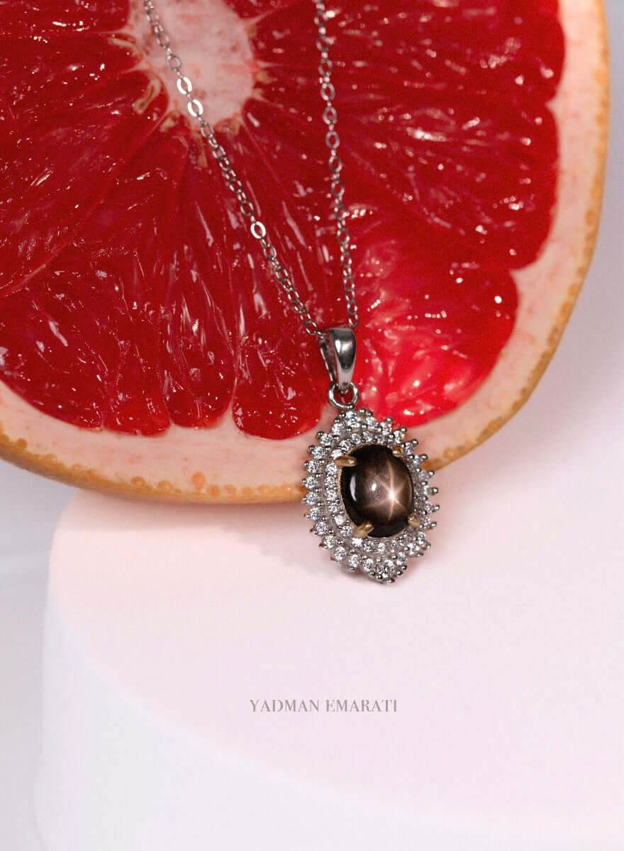 Star sapphire pendant necklace in white gold plated silver