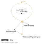 Gold necklace with measurement details on a white background