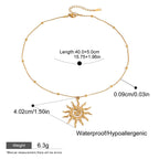 Gold necklace with sun pendant and measurement details on a white background