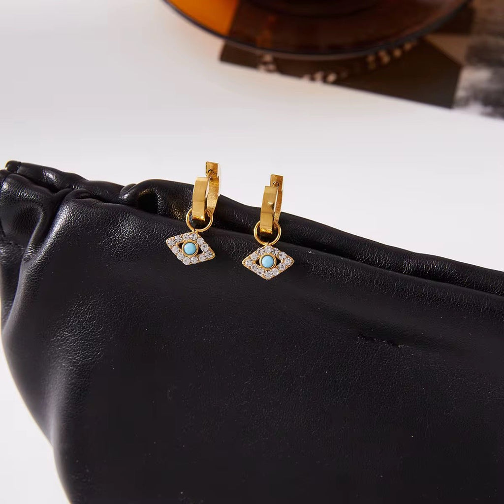 Turquoise Eye Huggie Earrings – Dubai Collection