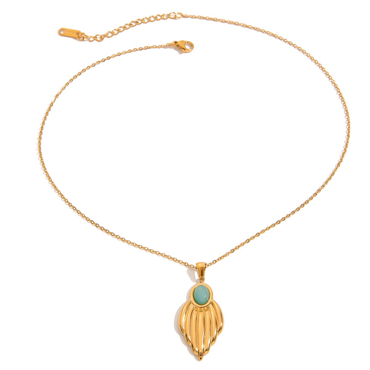 Gold necklace with a turquoise pendant on a white background