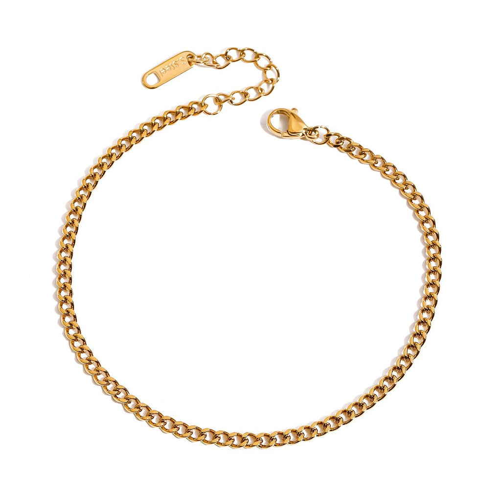 Gold chain bracelet on a white background