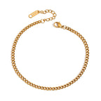 Gold chain bracelet on a white background