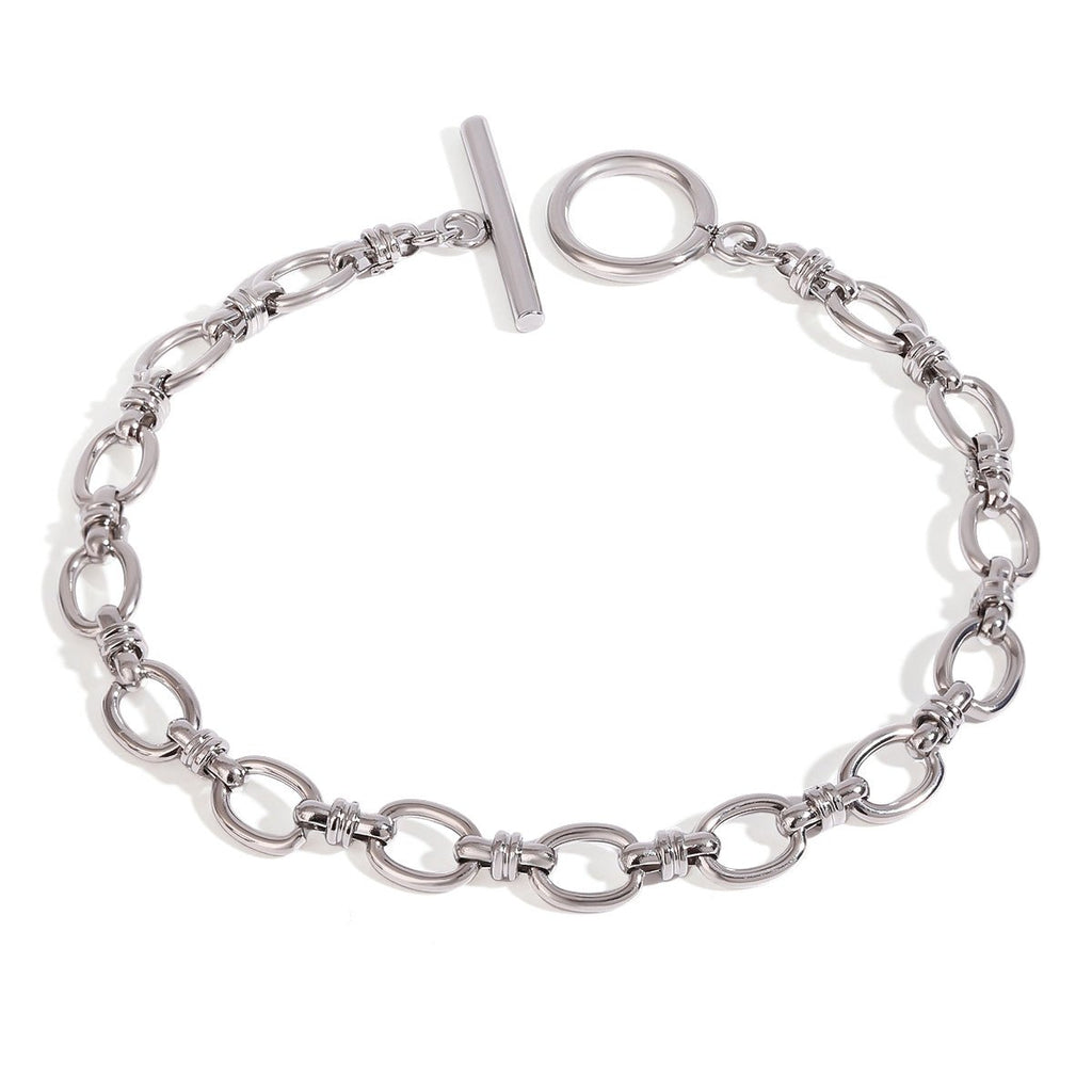 Silver chain bracelet with a clasp on a white background