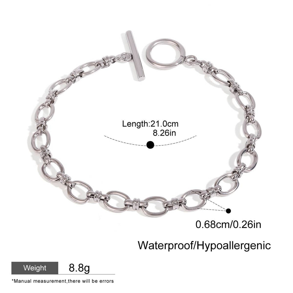Silver chain bracelet with clasp on a white background, showing measurements and product details.