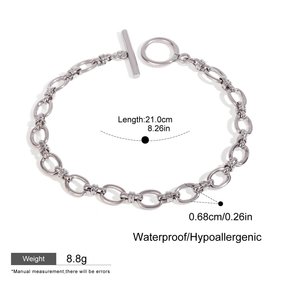 Silver chain bracelet with clasp on a white background, showing measurements and product details.